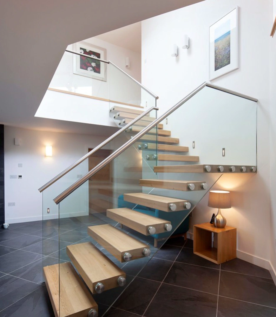 Contemporary floating wooden staircase with integrated lighting design