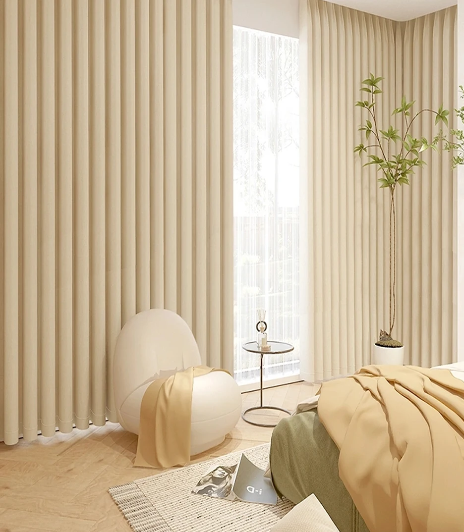 Elegant floor-to-ceiling fabric curtains with soft natural lighting