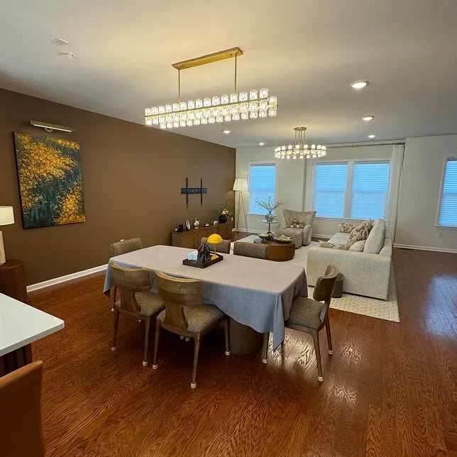 Modern living room featuring soft furniture, wooden flooring, and cohesive interior design details.